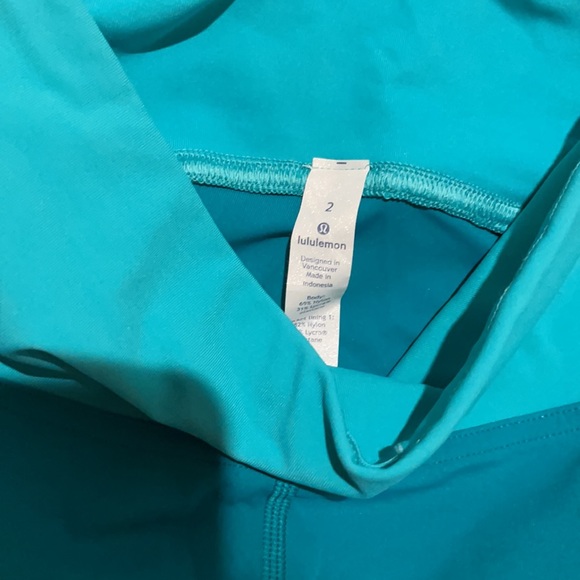 Lululemon athletics size 2 cropped turquoise and blue leggings with zipper! NEW - Picture 3 of 4